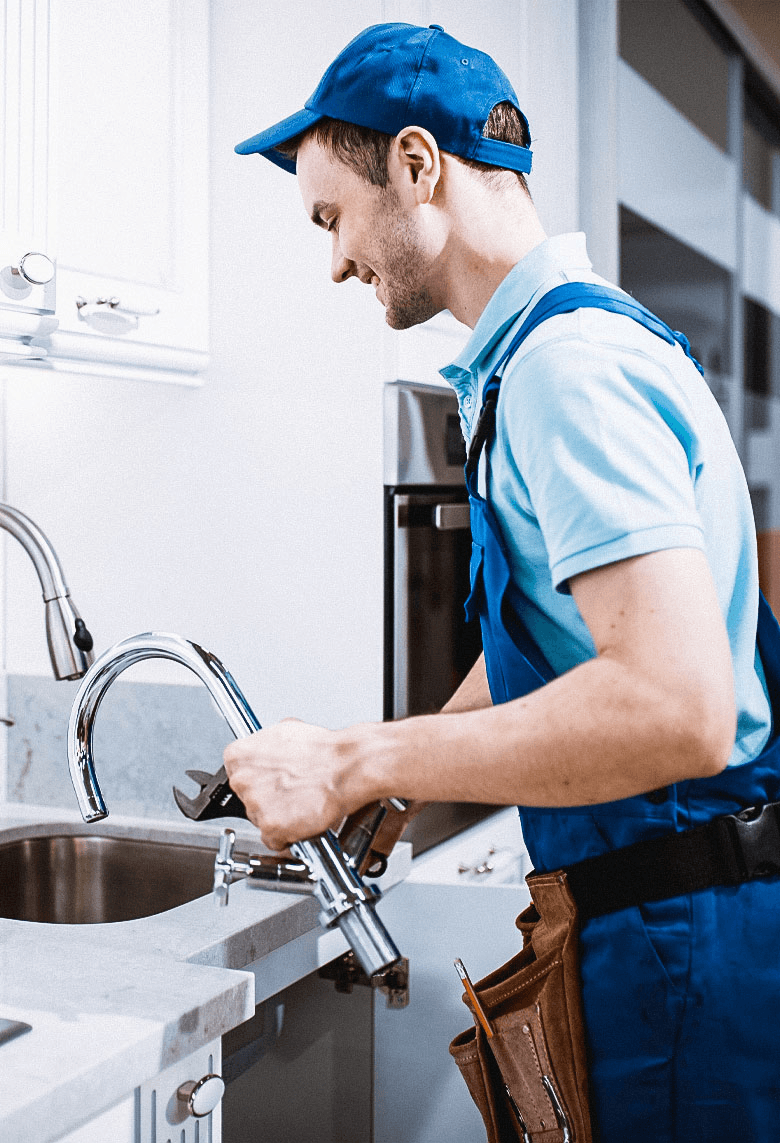 Professional plumber at work